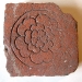 Incised brick floor tile