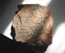 Incised floor tile